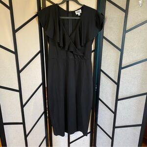 Unique Vintage Black Midi Dress with Ruffle Detail